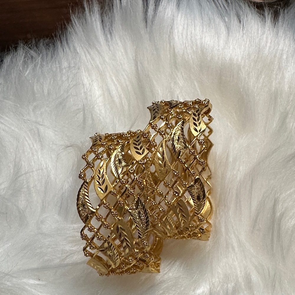 Elegant Gold tone Leaf Patterned Cuff Bracelet.   B